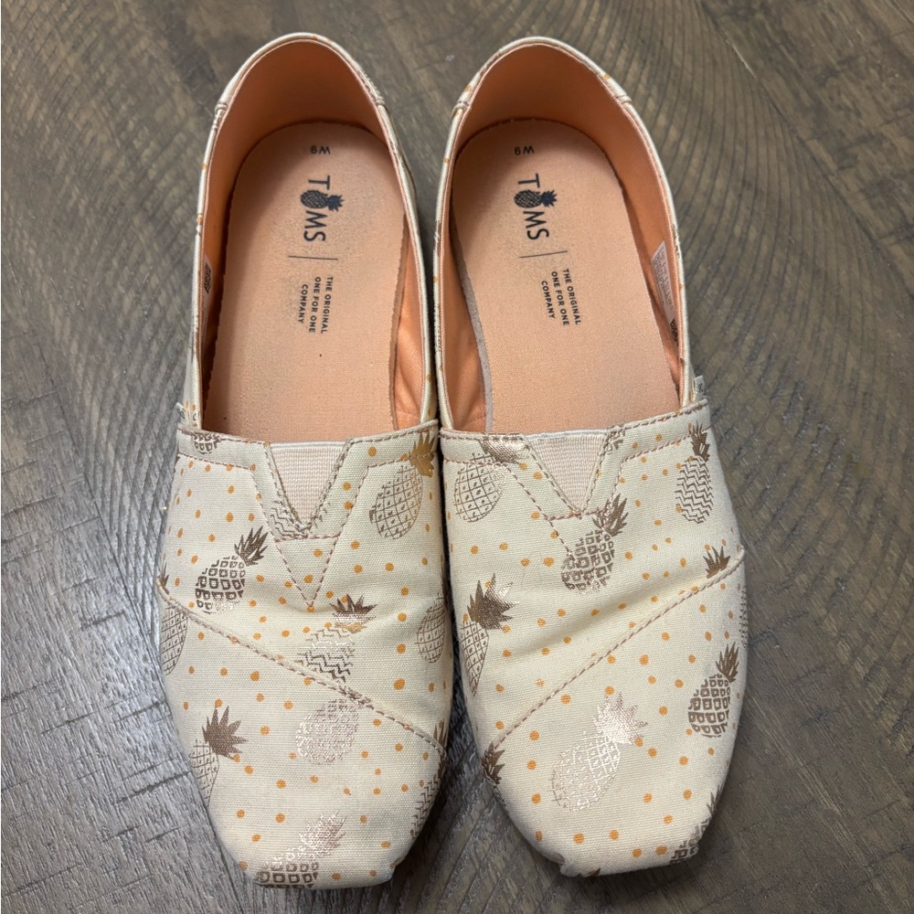TOMS Cream Canvas Slip-Ons with Gold Pineapple Print
